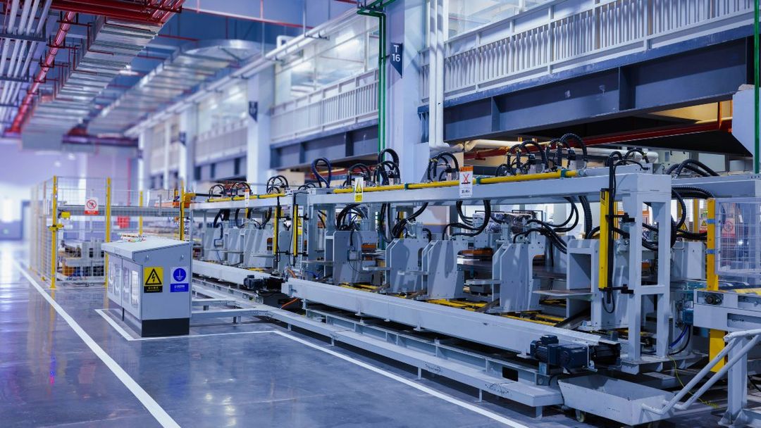 An industrial production line inside a modern factory